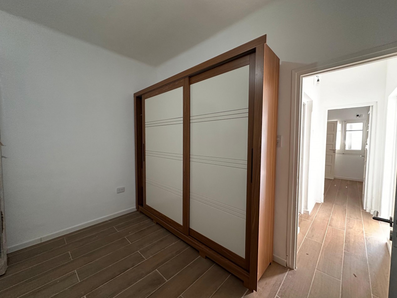 VENDO CASA 2 DOR, 2 BAÑOS, COCHERA, PATIO CON VERDE. ZONA CENTRO U$D 150.000